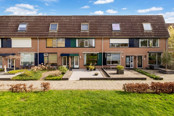 Foto - Te koop: tussenwoning gelegen aan groenvoorziening